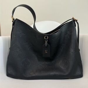 Authentic Louis Vuitton CarryAll MM empreinte black leather